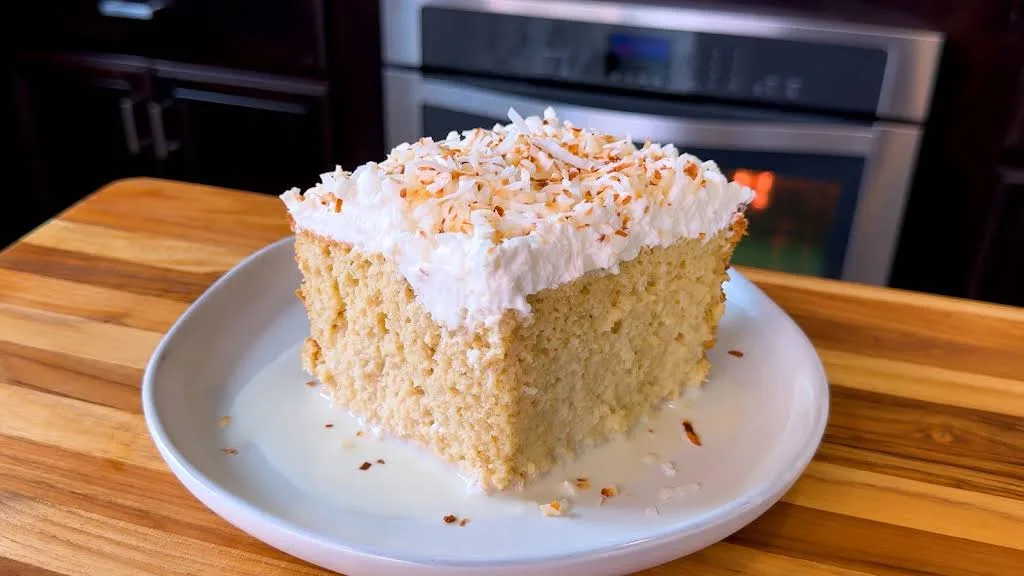Coconut Tres Leches Cake with Whipped Cream and Toasted Coconut