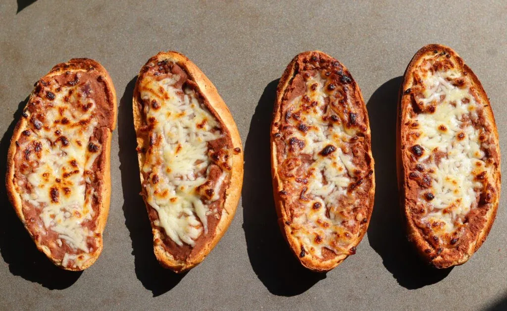 Molletes -- Mexican Bean and Cheese Sandwiches